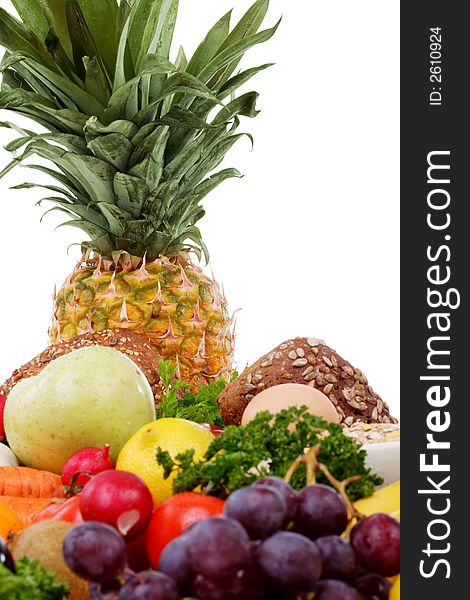 Fresh Vegetables, Fruits and other foodstuffs. Shot in a studio. Fresh Vegetables, Fruits and other foodstuffs. Shot in a studio.