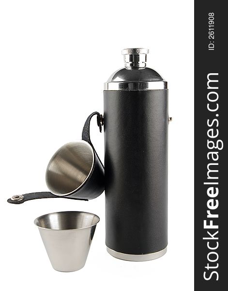 Stainless steel flask with two cups isolated on white. Stainless steel flask with two cups isolated on white