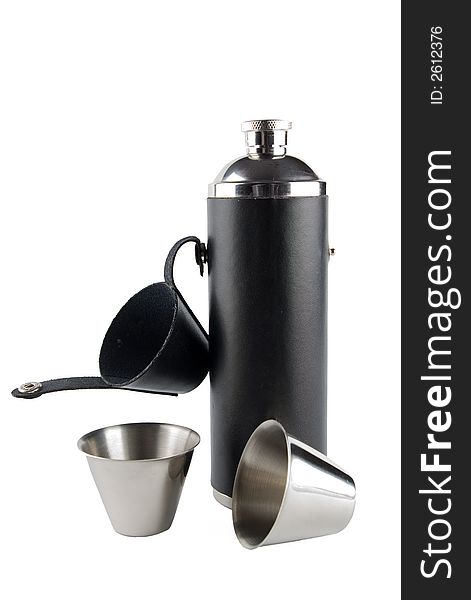 Two steel cups and hip flask on white. Two steel cups and hip flask on white