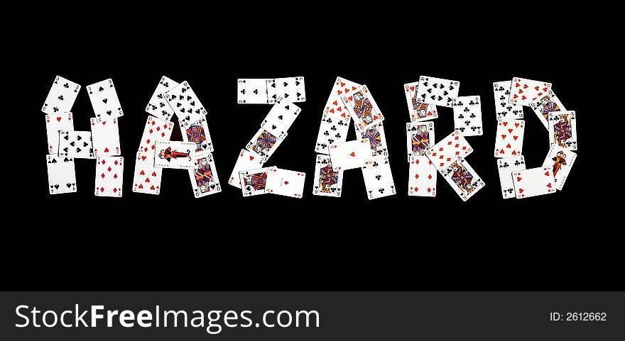 Hazard word created by playing cards on black background