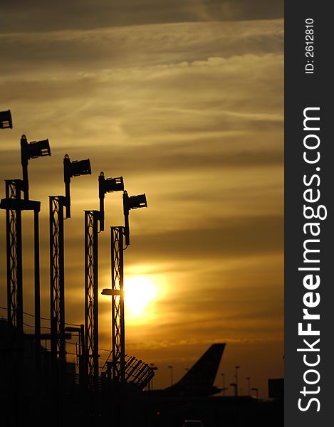 Landing lights and sunset in an airport. Landing lights and sunset in an airport
