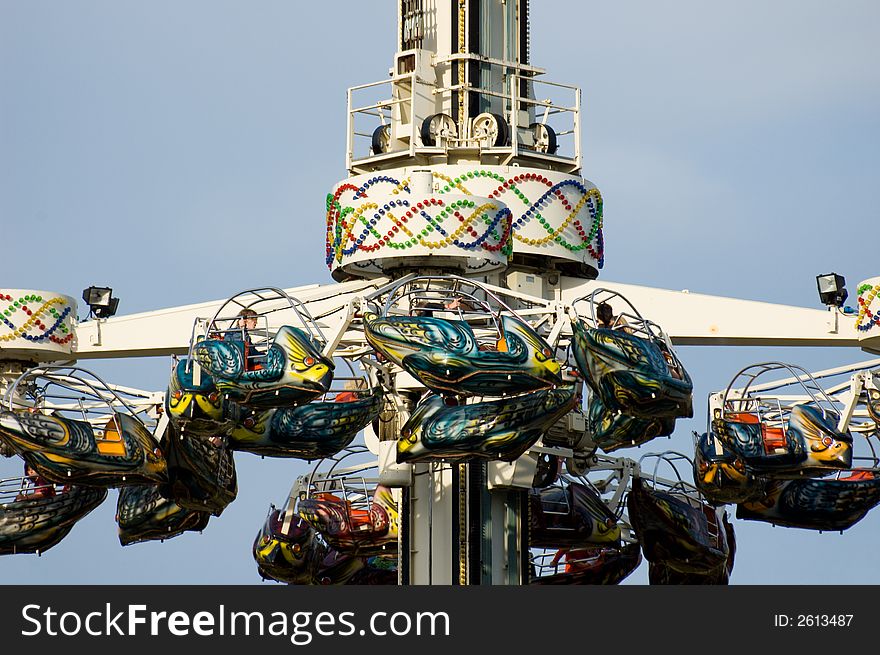 Amusement park ride on a sunny afternoon