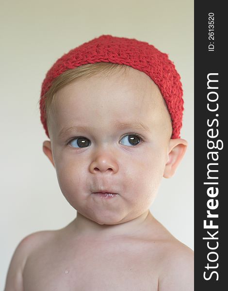 Image of cute toddler wearing a crochet cap