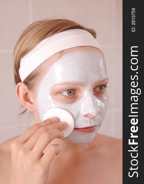 Refreshing mask to the face and beautiful woman. Refreshing mask to the face and beautiful woman