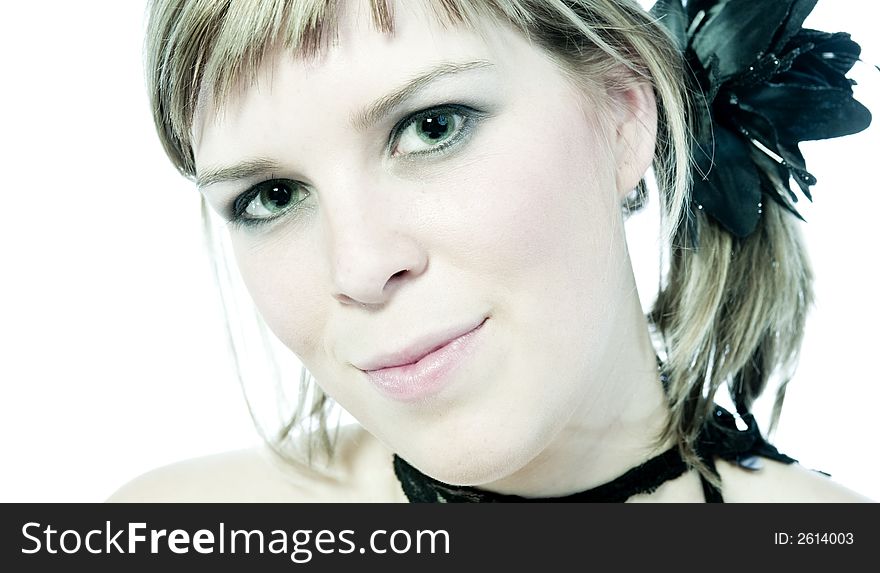 A young caucasian woman portrait taken in the studio on a white background. A young caucasian woman portrait taken in the studio on a white background