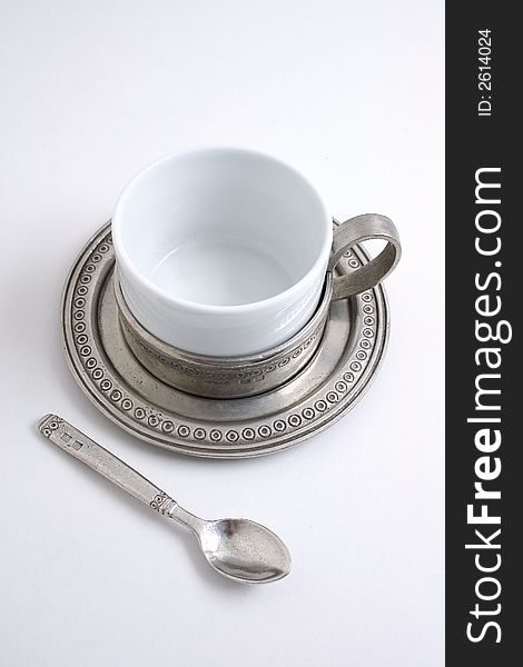 Old fashioned tea cup with metal. Old fashioned tea cup with metal