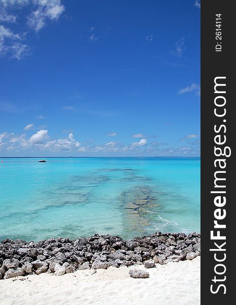 Tropical maldivian beach with rocks and turquoise ocean. Tropical maldivian beach with rocks and turquoise ocean