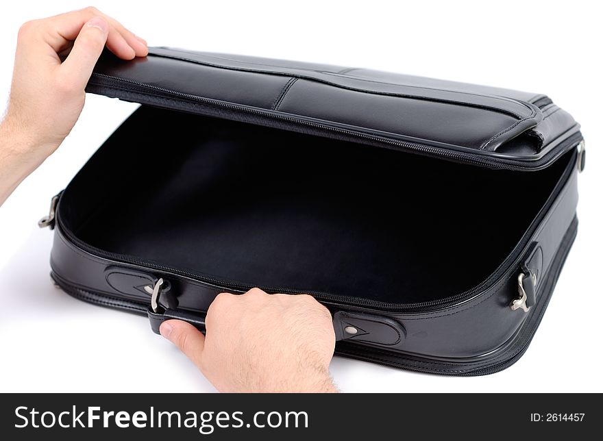 Male hands opening black briefcase over white background. Male hands opening black briefcase over white background