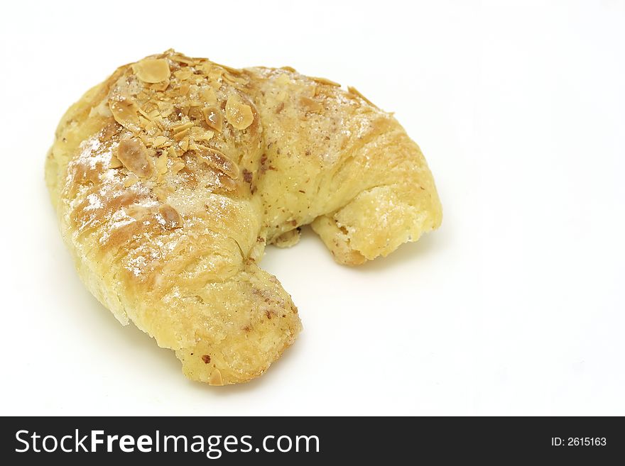 Almond croissant isolated on white background