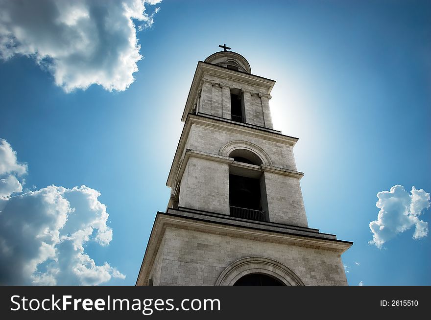 Sun behind the bell tower