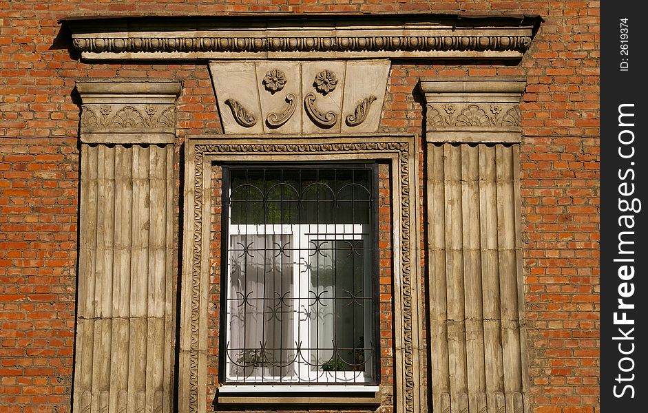 old window with architectural decor. old window with architectural decor