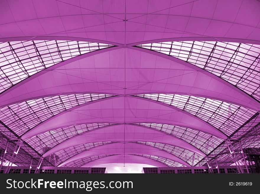 Metallic and glass roof structure