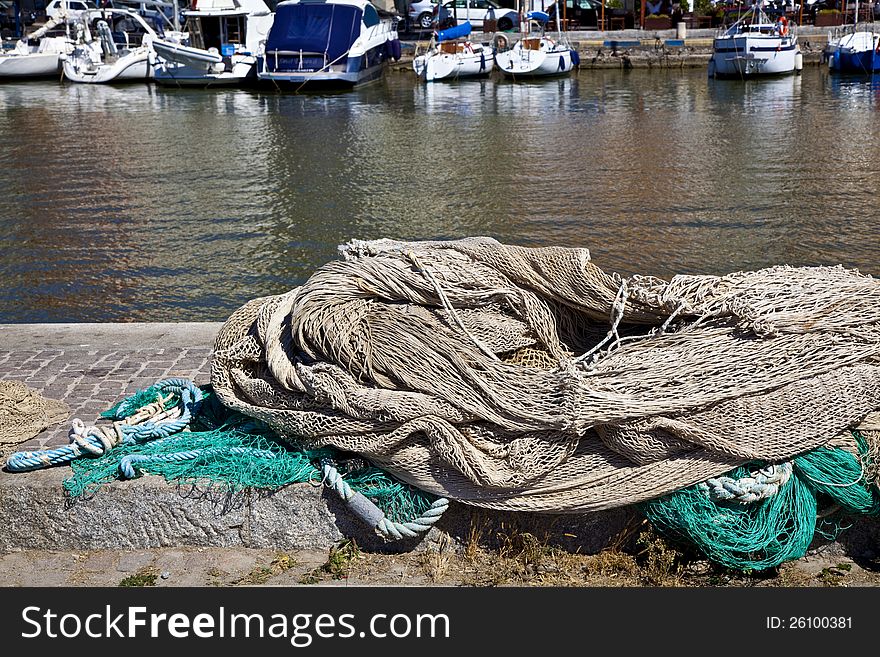 Fishing nets in the harbor in Tuscany