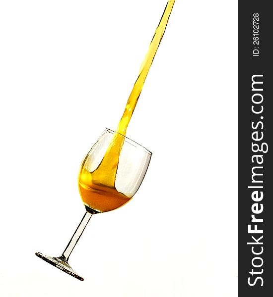 Orange liquid pouring upwards from a wine glass. Orange liquid pouring upwards from a wine glass
