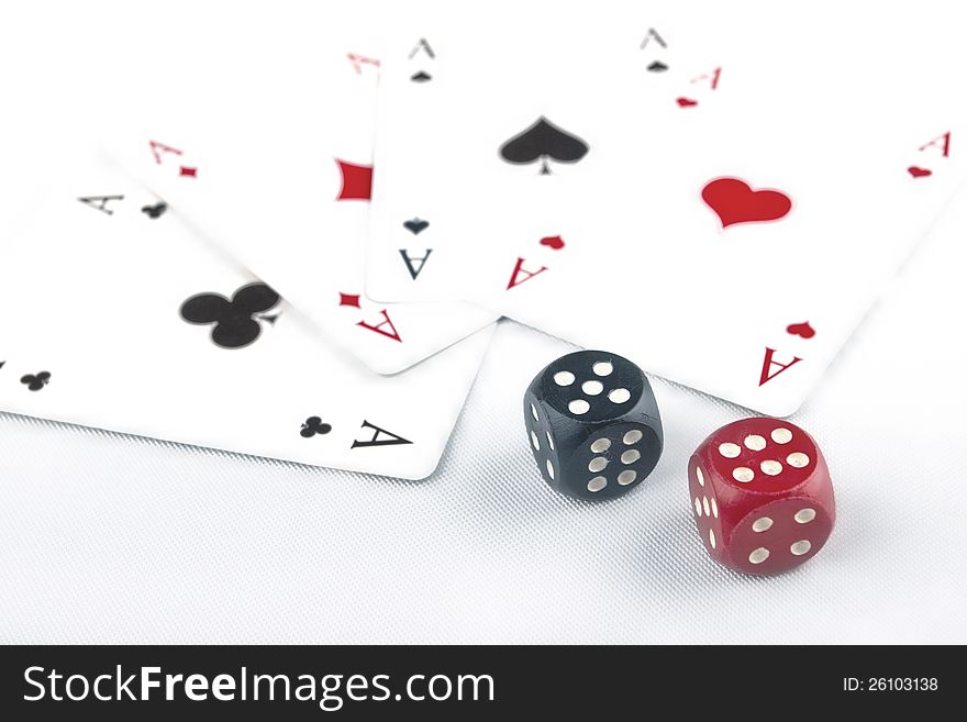 Two dices and playing cards for poker on white background. Two dices and playing cards for poker on white background