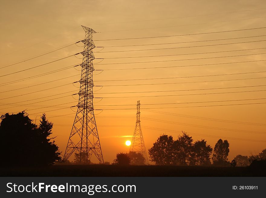 Electric power station on morning background. Electric power station on morning background.