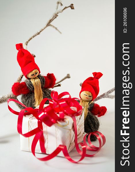 Old-fashioned Santa Clauses with Christmas gift. Old-fashioned Santa Clauses with Christmas gift