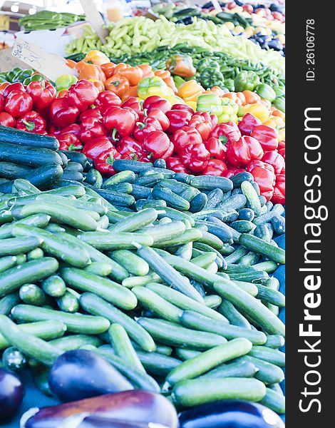 Layout of various vegetables for sale at a farmers market. Layout of various vegetables for sale at a farmers market.
