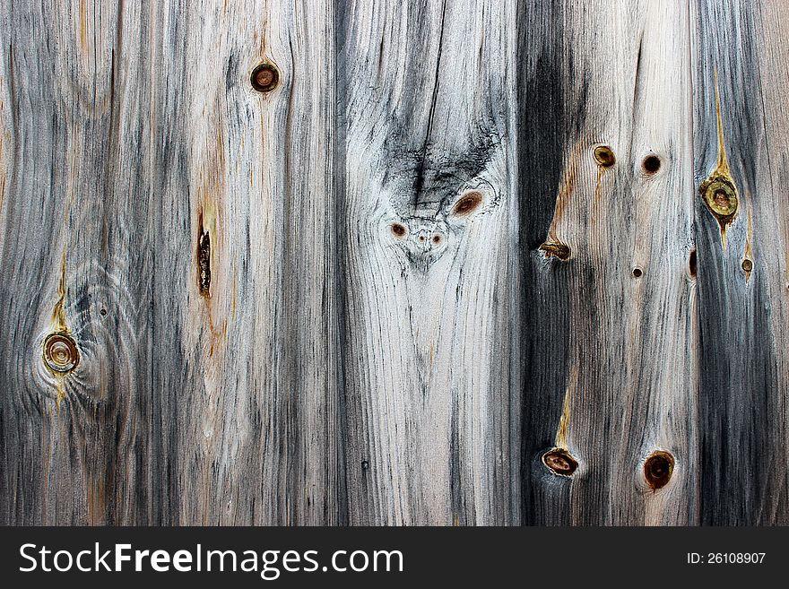 Old weathered wood with knots running throughout. Old weathered wood with knots running throughout.