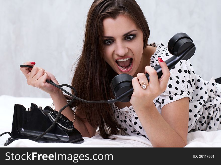 Brunette Talking On The Retro Phone