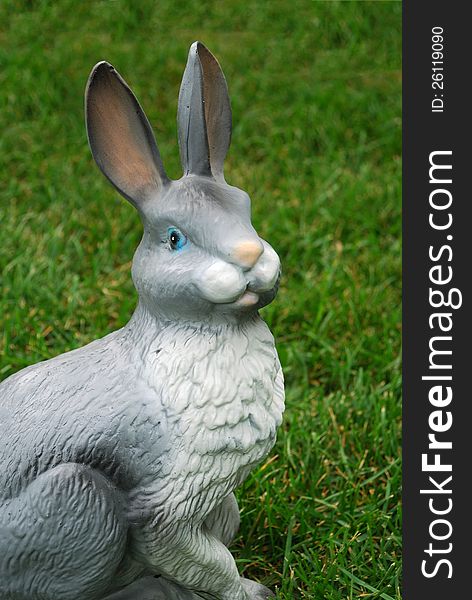 Plastic bunny on the grass