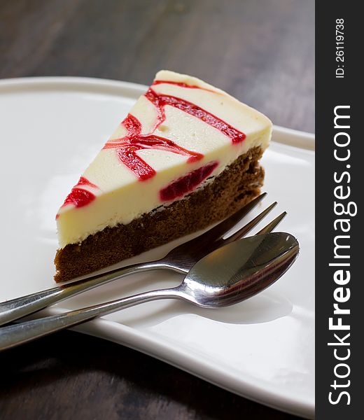 Strawberry cheese cake on wood table