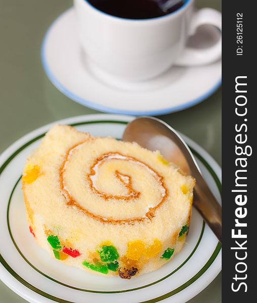 Closeup Of Roll Sponge Cake, Focus On Fruit Garnis