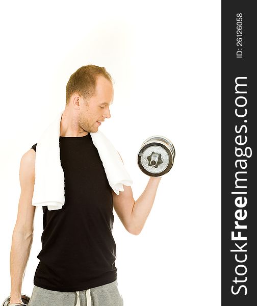 Man in sportswear ready to lift the dumbbells and for exercise. Man in sportswear ready to lift the dumbbells and for exercise.