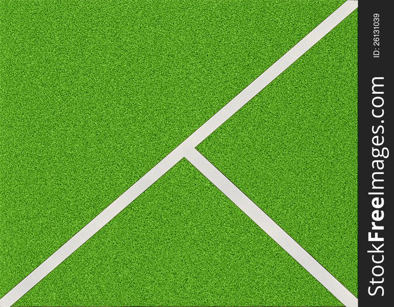 White stripes on the green soccer field from top view. White stripes on the green soccer field from top view