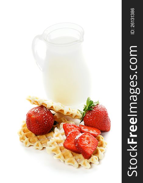 Delicious Waffles, Perfect Strawberries with Sugar Powder and Milk Jug on white background. Delicious Waffles, Perfect Strawberries with Sugar Powder and Milk Jug on white background