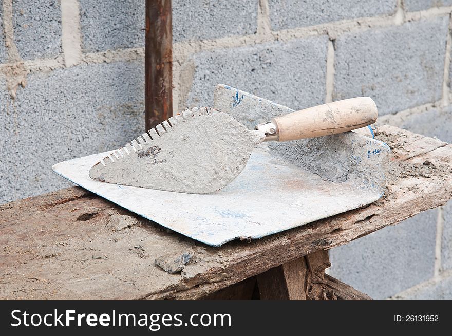 Trowel and plastic construction tools for bricklayer