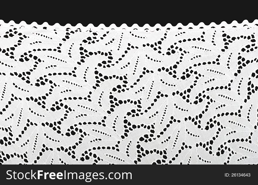 White lace on a black background