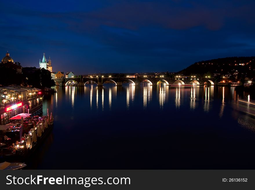 Night look on nabarezhny the Vltava Rivers and Karlov Bridge in Prague. Night look on nabarezhny the Vltava Rivers and Karlov Bridge in Prague