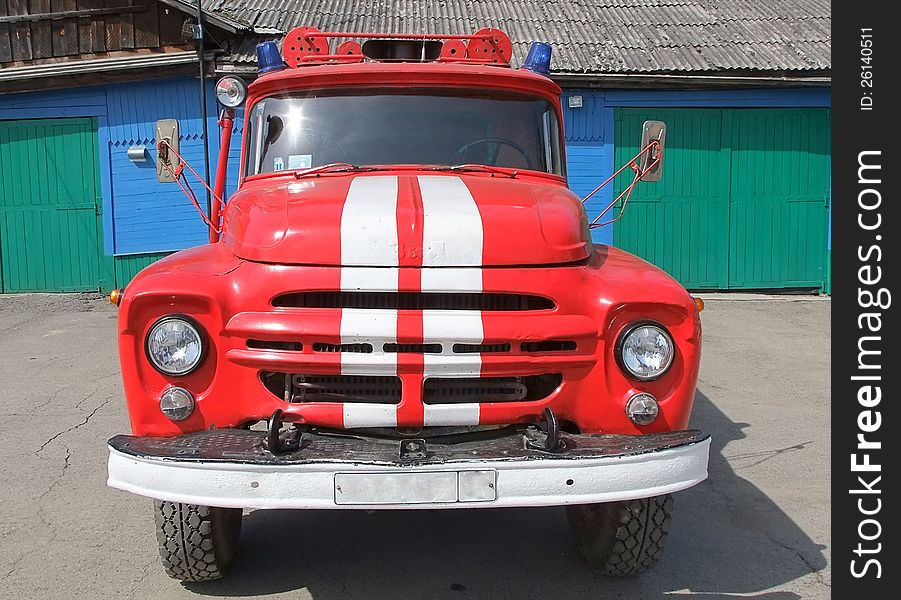 Red with white stripes fire truck