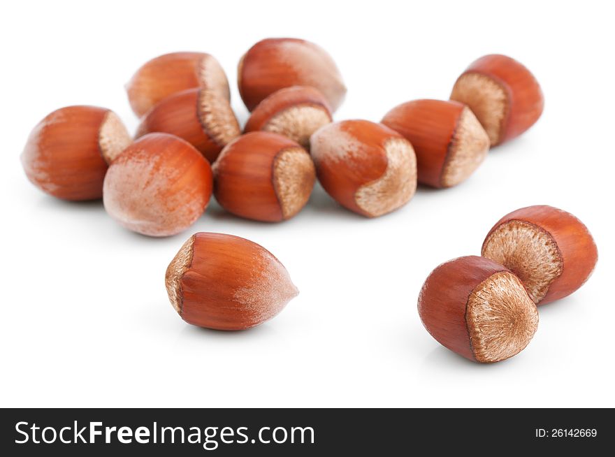 Heap of filbert nuts  on white background