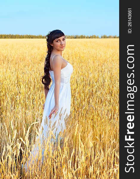 Woman In White Dress In Field With Wheat