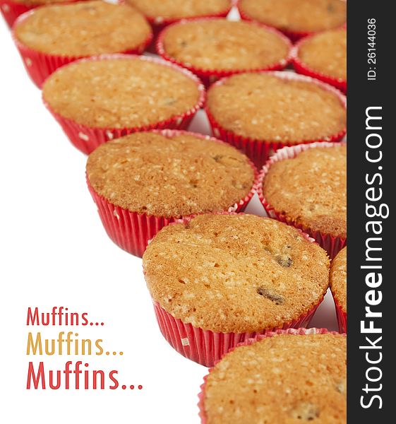 Muffins in the red molds with sample text. Muffins in the red molds with sample text
