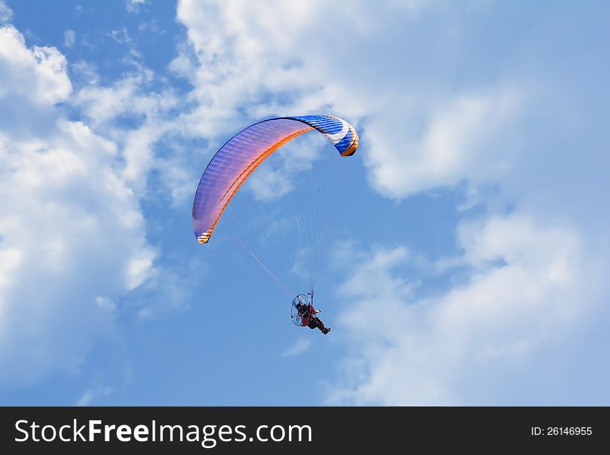 Glider In The Sky With Clouds