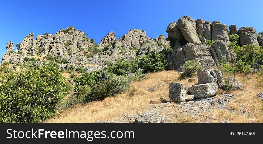 Unusual mountain formations with vegetation. Unusual mountain formations with vegetation