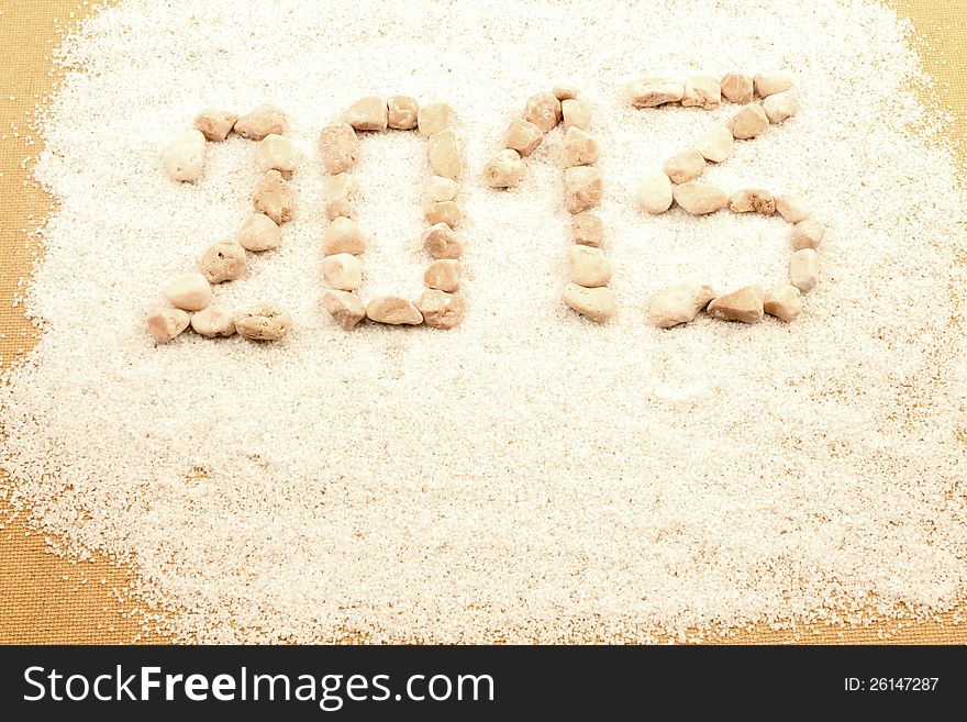 New year 2013 written with pebbles. New year 2013 written with pebbles.