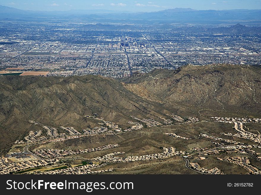 Phoenix, Arizona from behind South Mountain. Phoenix, Arizona from behind South Mountain