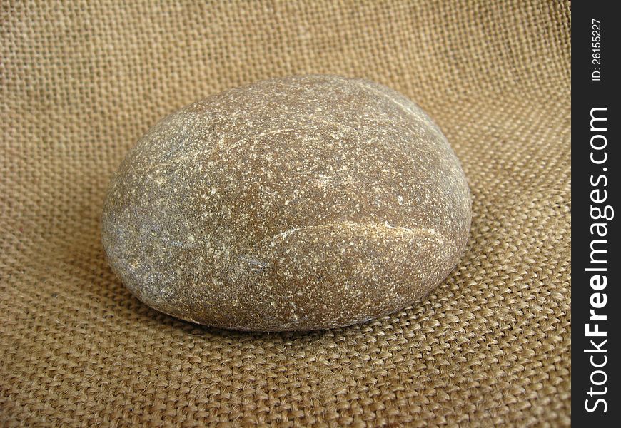 Marine stone on a brown background
