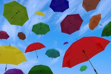 Flying Of Multicoloured Umbrellas Royalty Free Stock Photos