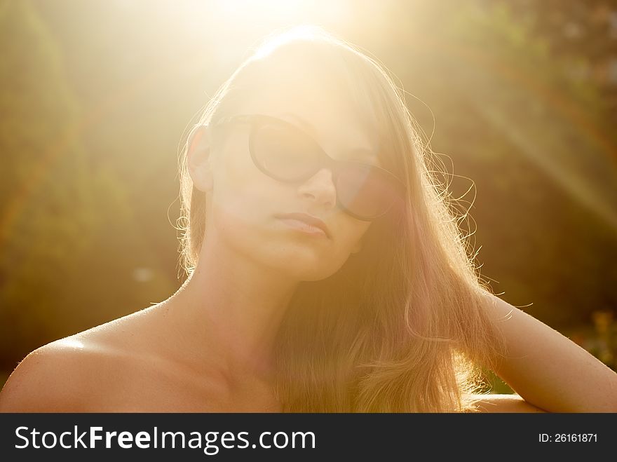 Portrait of young model in contr sunlight outdoor. Portrait of young model in contr sunlight outdoor