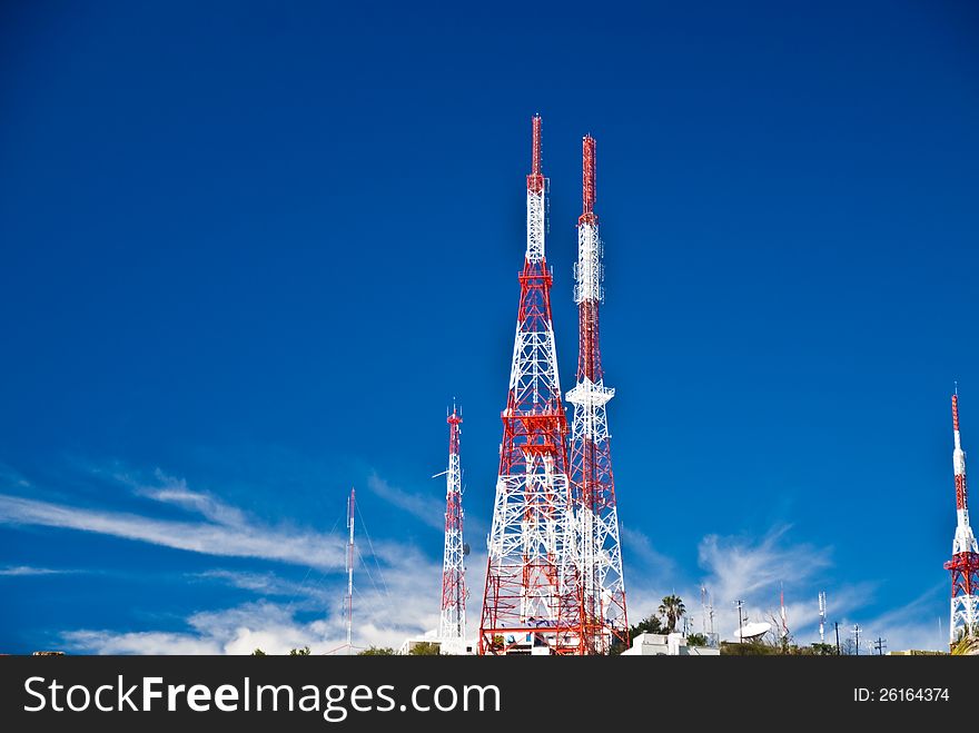 Communication towers on Mexican hillside