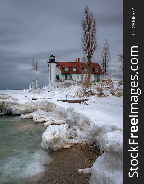 Point Betsie Lighthouse along the eastern shores of Lake Michigan during winter. Point Betsie Lighthouse along the eastern shores of Lake Michigan during winter.