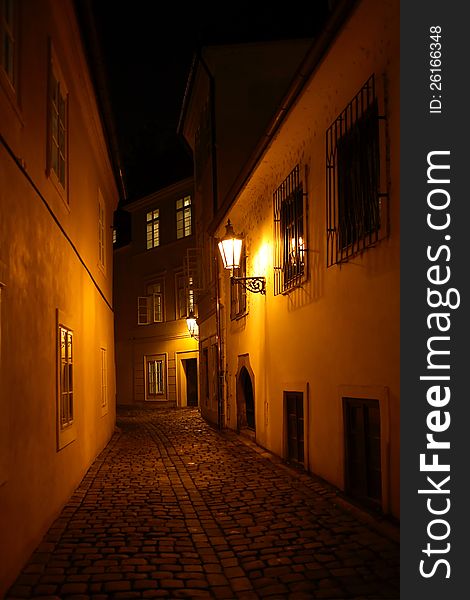 Narrow street in old town with luminous lanterns at night. Narrow street in old town with luminous lanterns at night