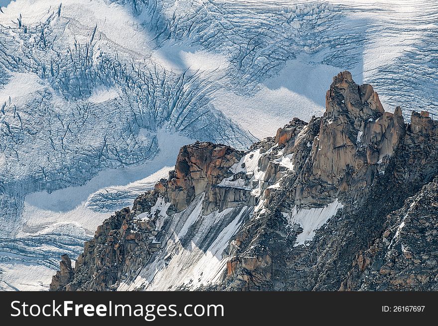 Rock against the Glacier of Mont Blanc near Chamonix in France.