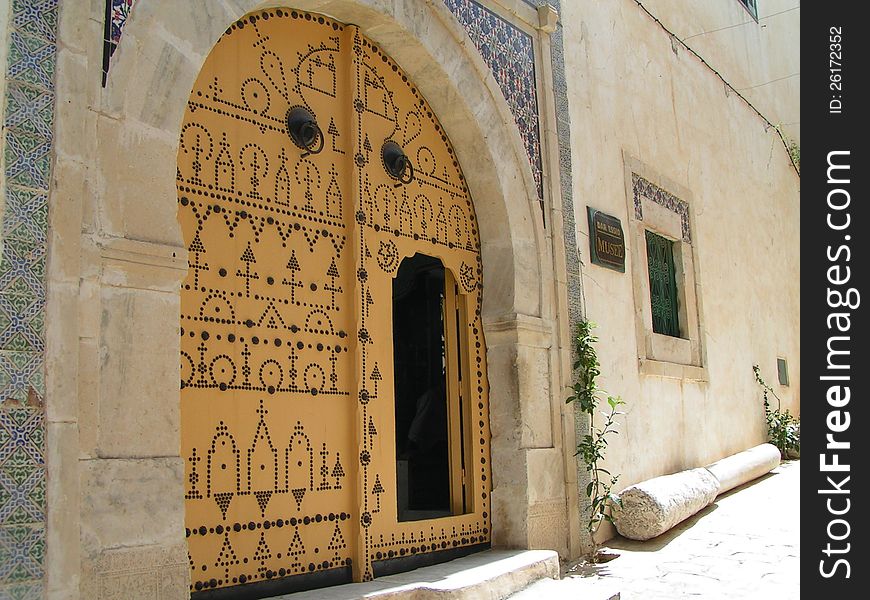Taken in Tunisia, it shows an typically ornate door at the Dar Essed Museum in Sousse.