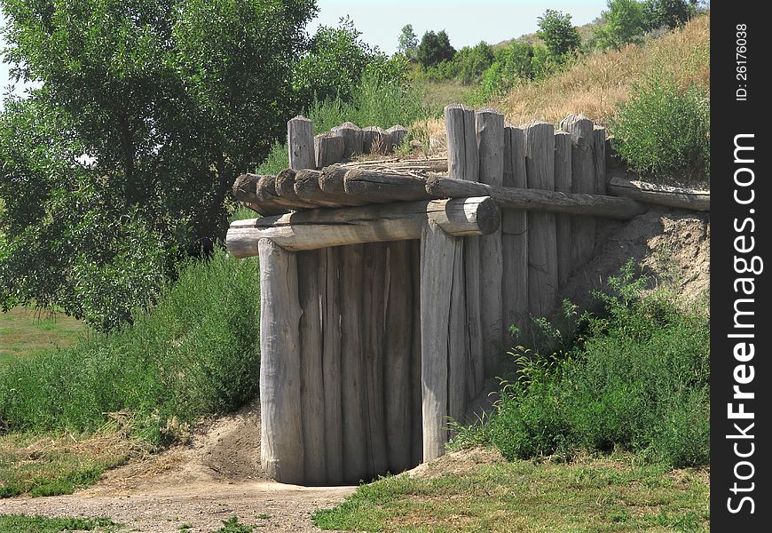 Close-up of the entrance to an American northern plains Indian earth lodge house. Close-up of the entrance to an American northern plains Indian earth lodge house.